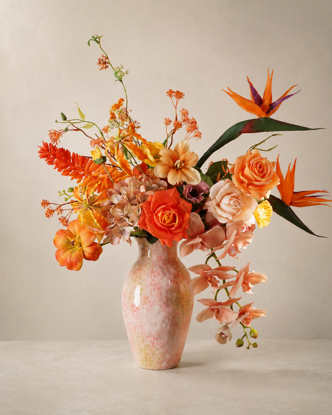Orange Bird of Paradise Faux Floral Arrangement in Pink Glass Vase