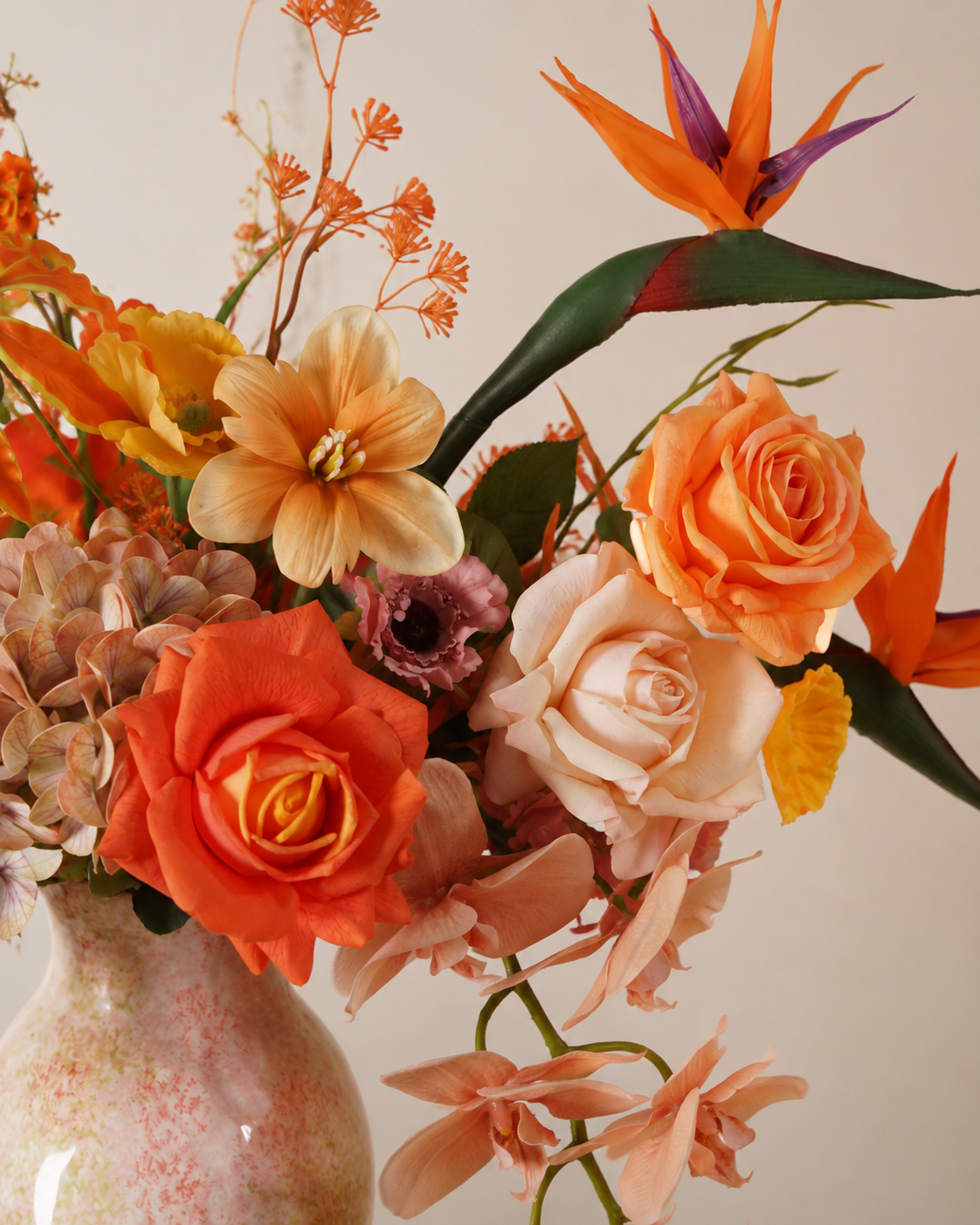 Orange Bird of Paradise Faux Floral Arrangement in Pink Glass Vase