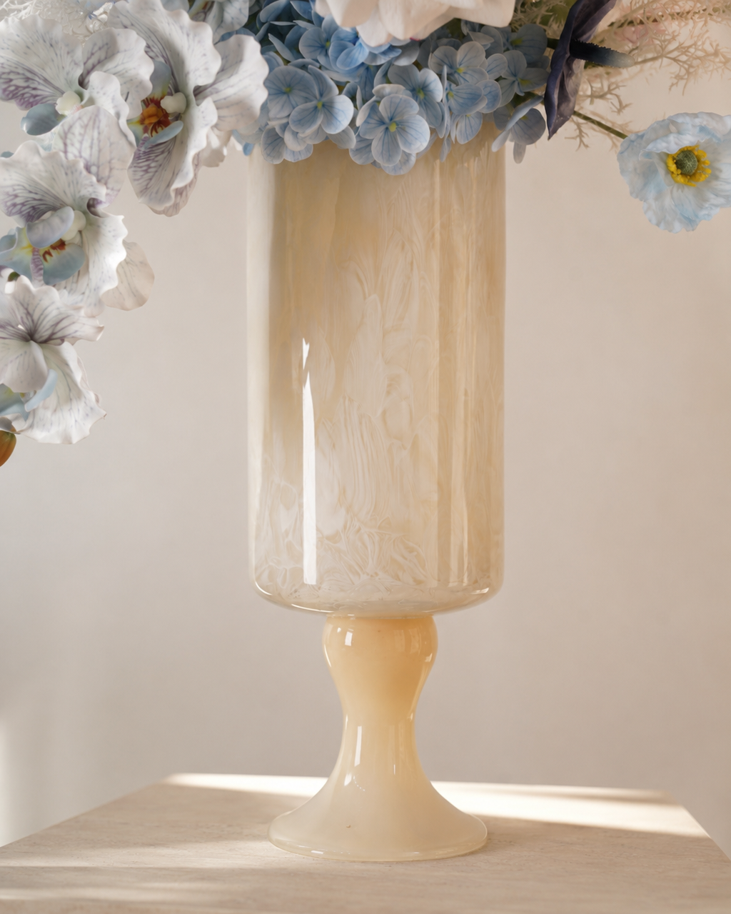 Blue & White Faux Floral Arrangement in Ivory Pedestal Glass Vase