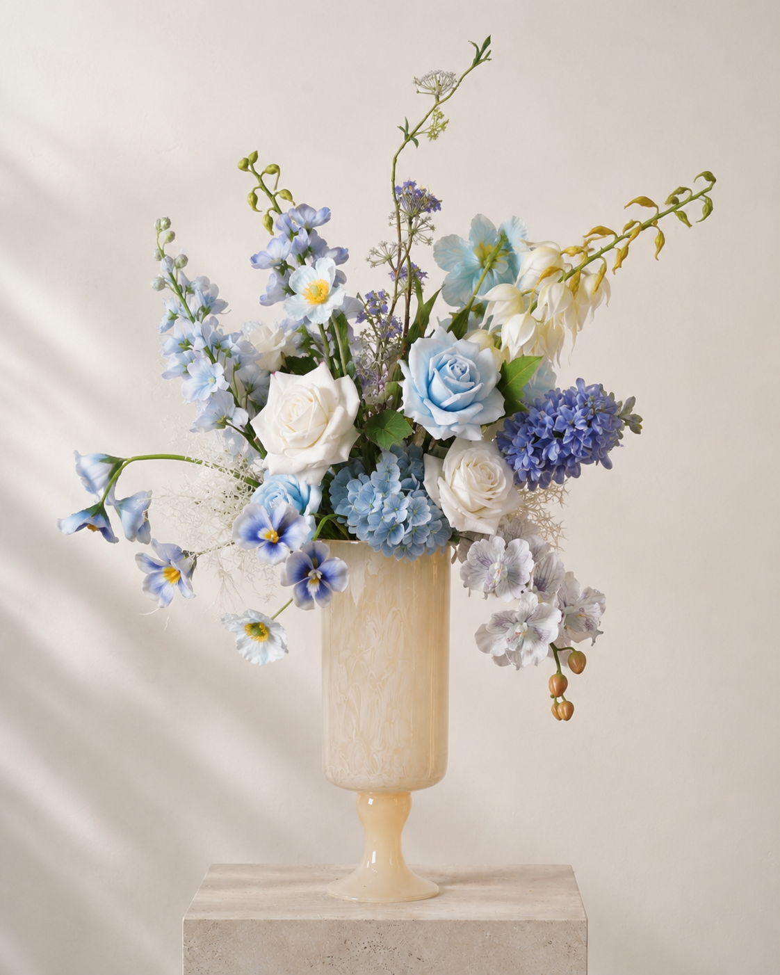 Blue & White Faux Floral Arrangement in Ivory Pedestal Glass Vase
