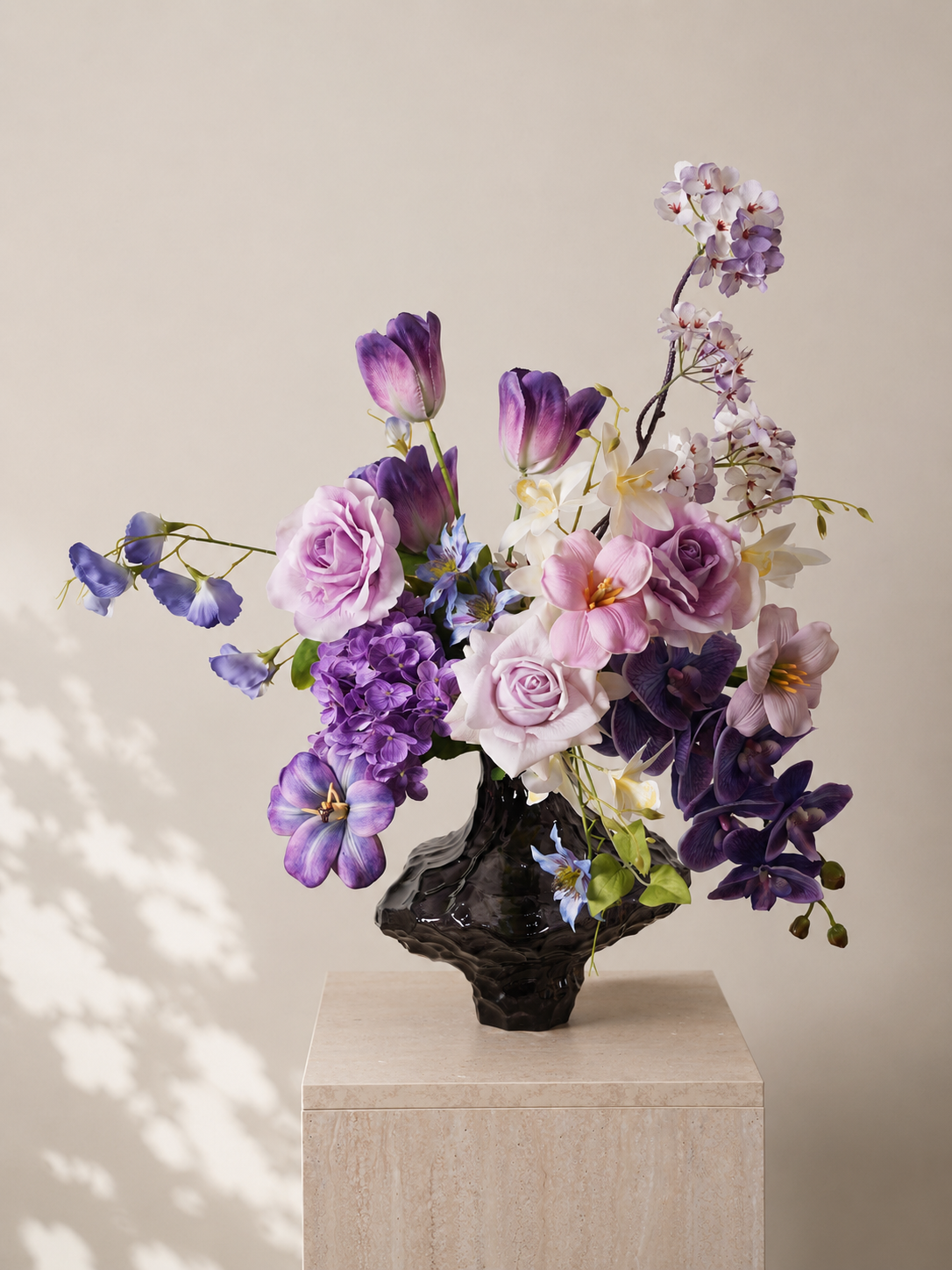 Purple Tulip & Orchid Faux Floral Arrangement in Clear Sculptural Glass Vase