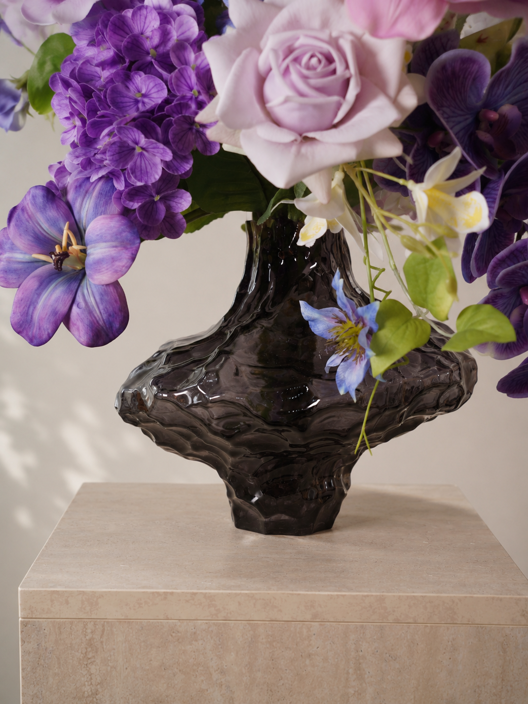 Purple Tulip & Orchid Faux Floral Arrangement in Clear Sculptural Glass Vase