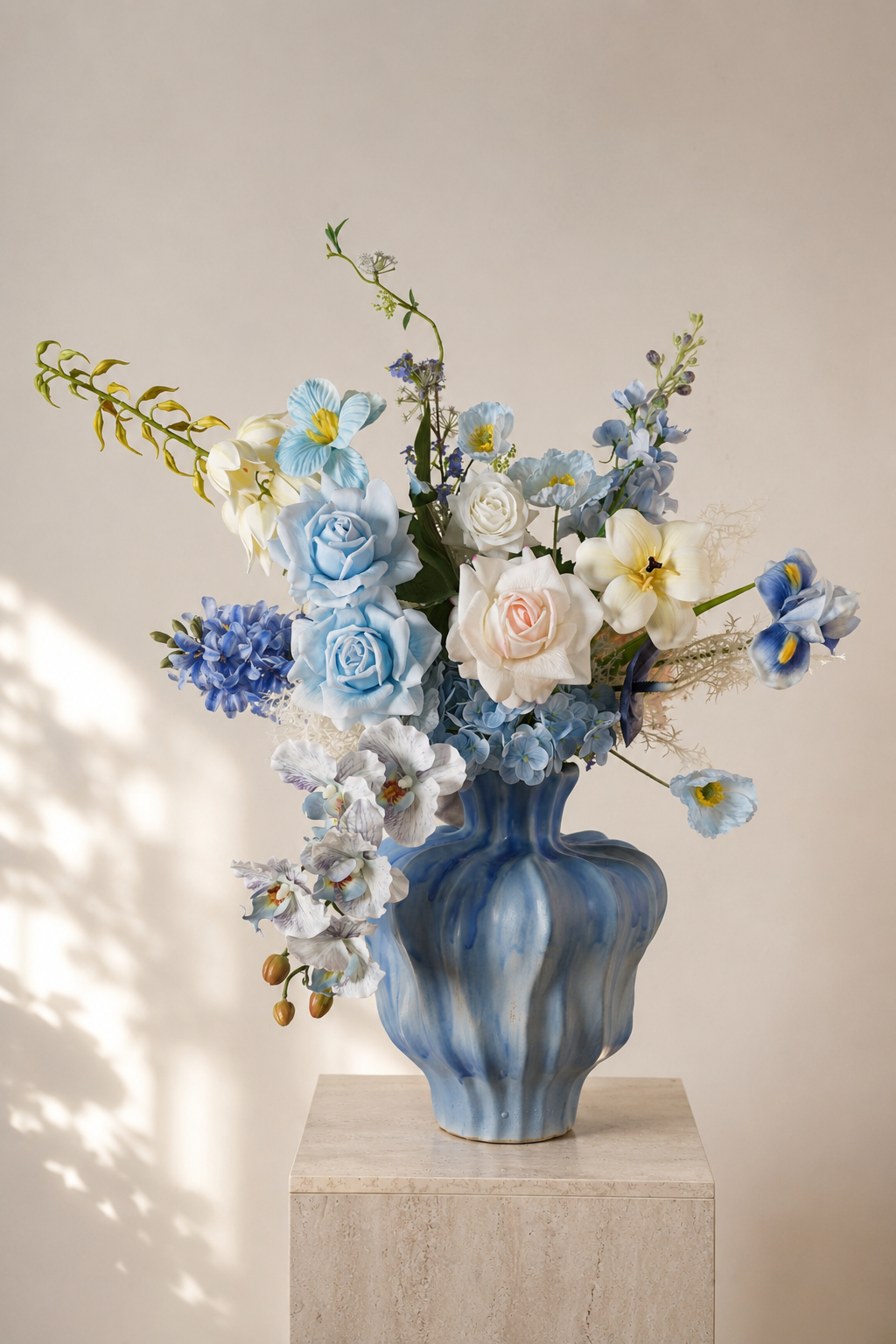 Blue Hydrangea & Rose Faux Floral Arrangement in Sculptural Blue Ceramic Vase