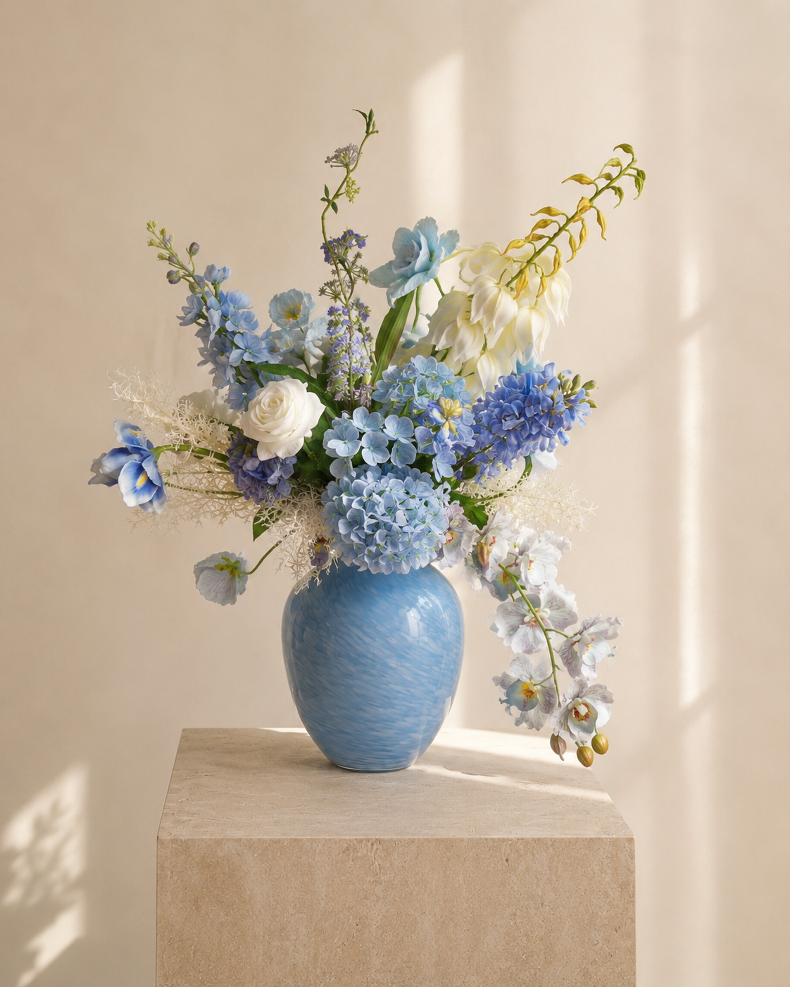 Blue & White Faux Floral Arrangement in Blue Ceramic Vase