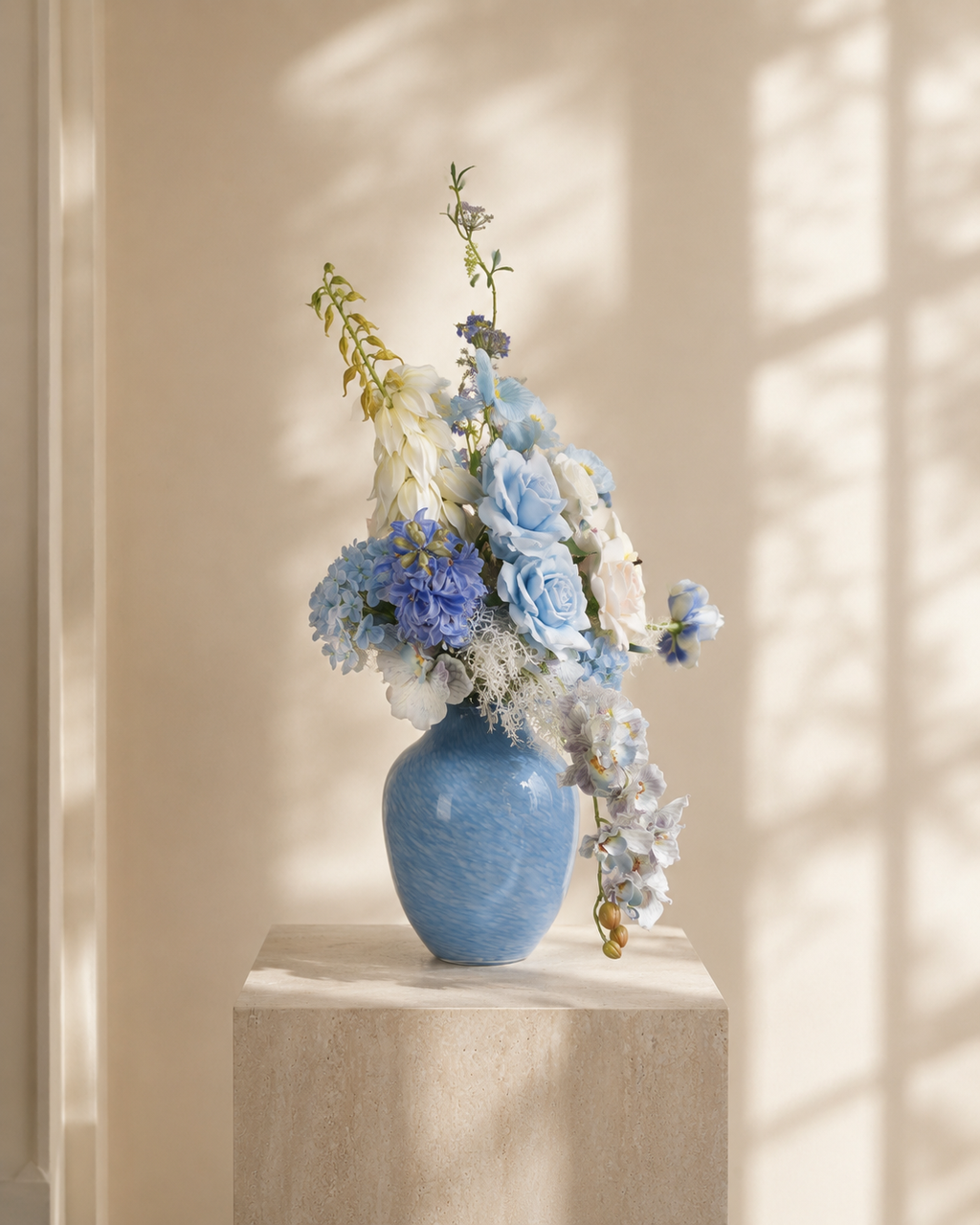 Blue & White Faux Floral Arrangement in Blue Ceramic Vase