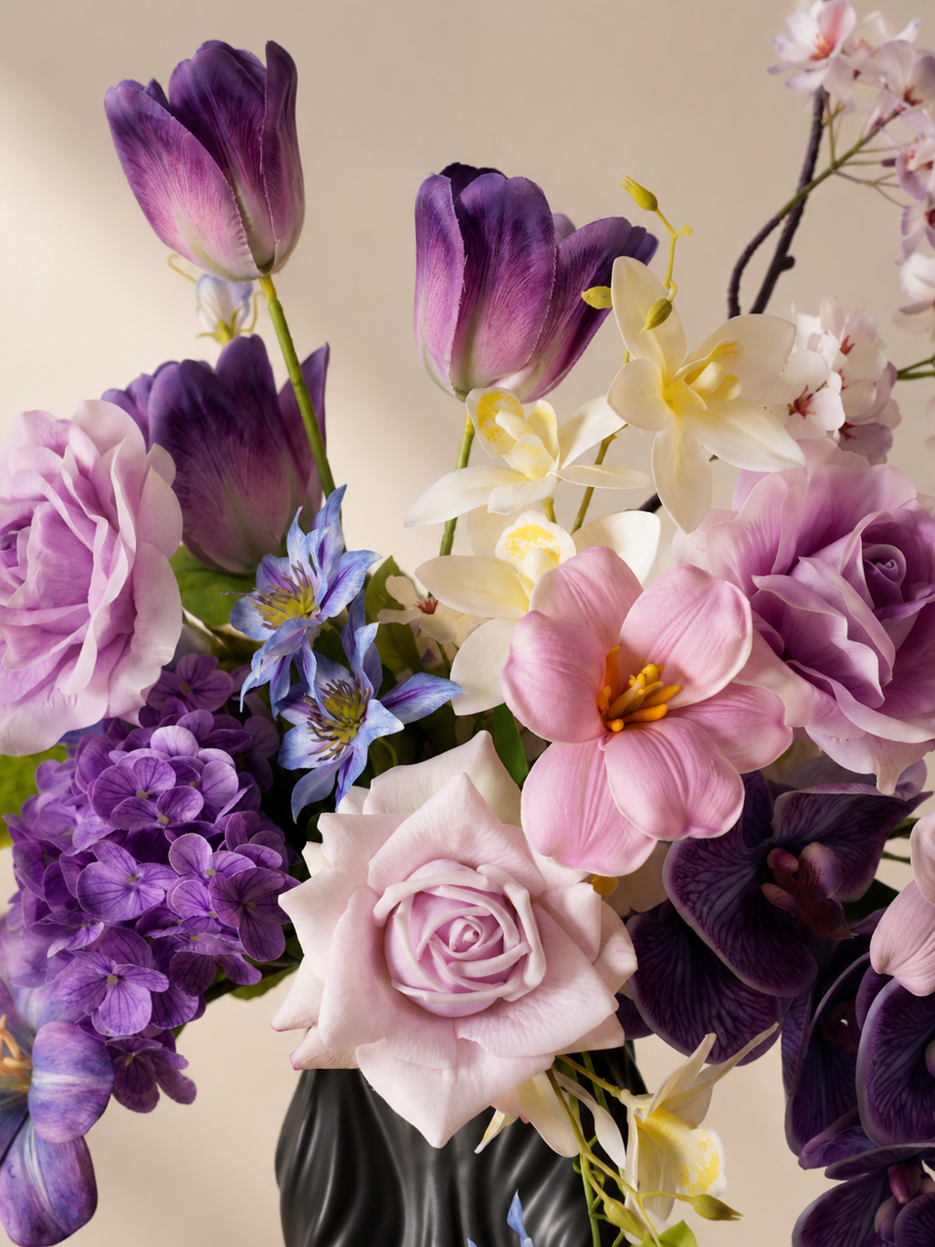 Purple Tulip & Orchid Faux Floral Arrangement in Tall Black Sculptural Vase