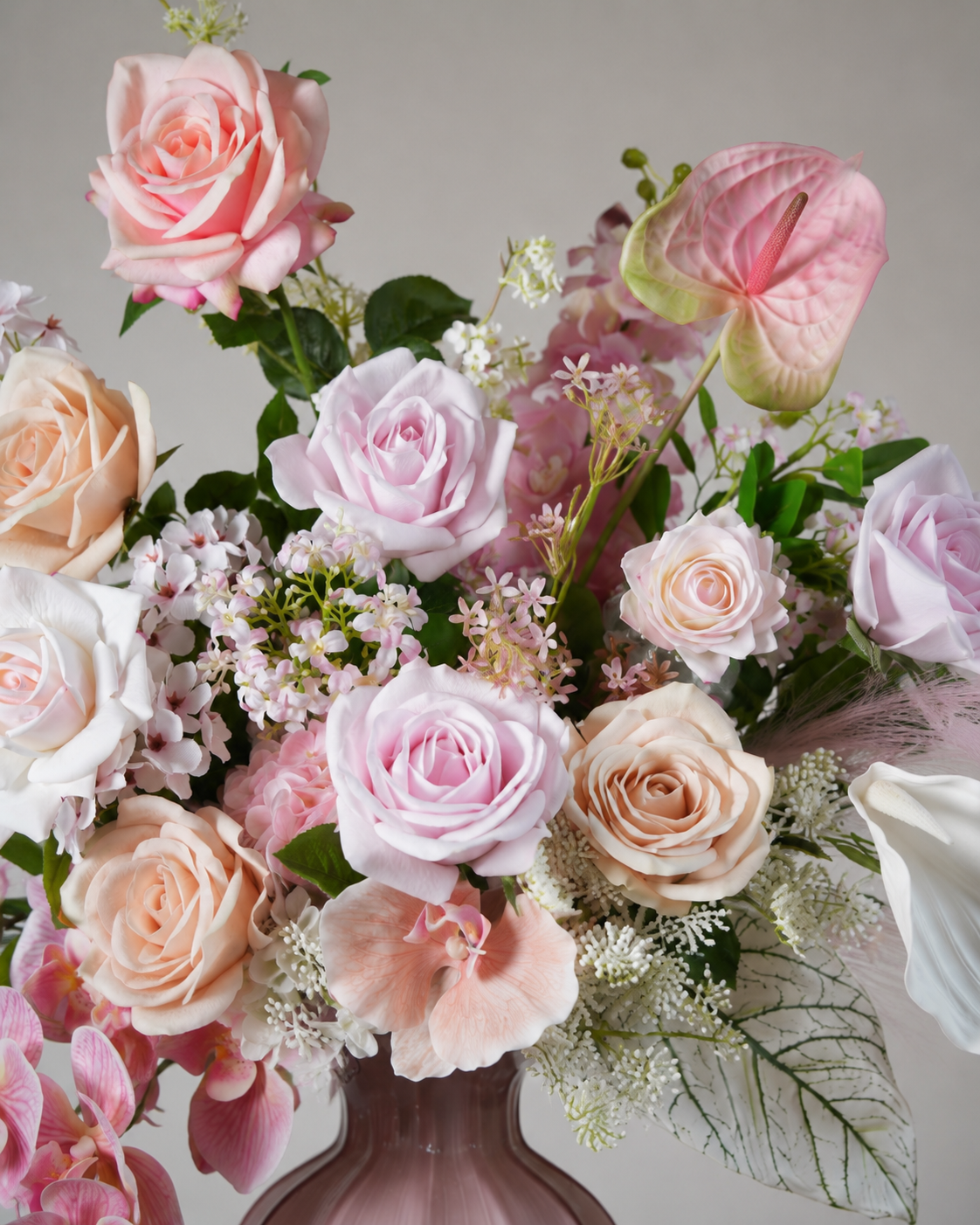Pink Rose & Orchid Faux Floral Arrangement in Pink Glass Vase