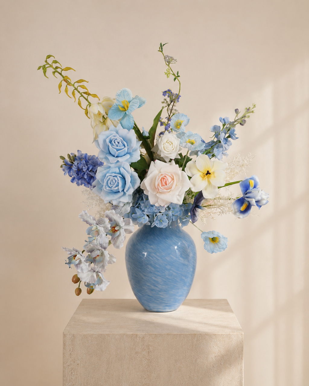 Blue & White Faux Floral Arrangement in Blue Ceramic Vase