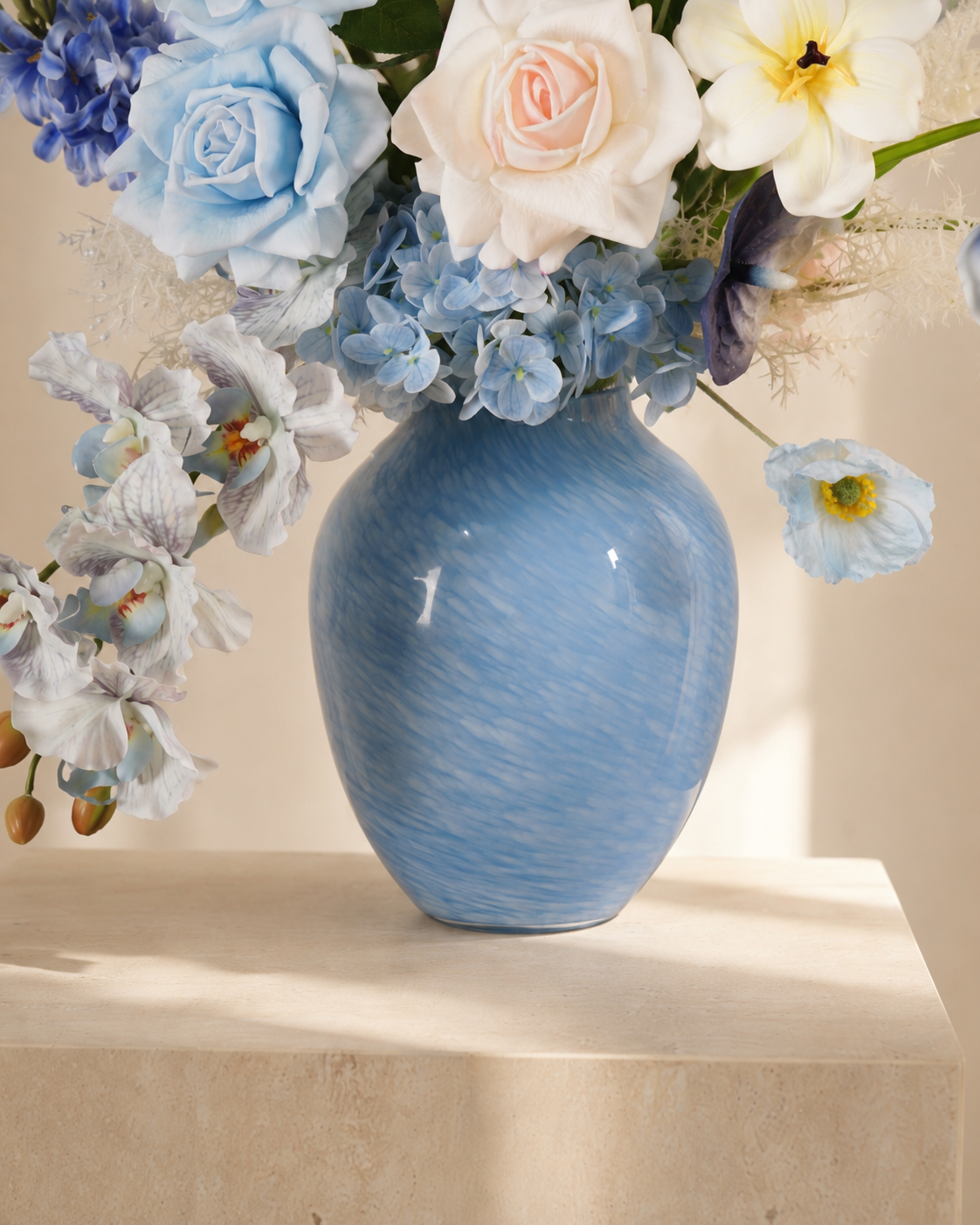 Blue & White Faux Floral Arrangement in Blue Ceramic Vase