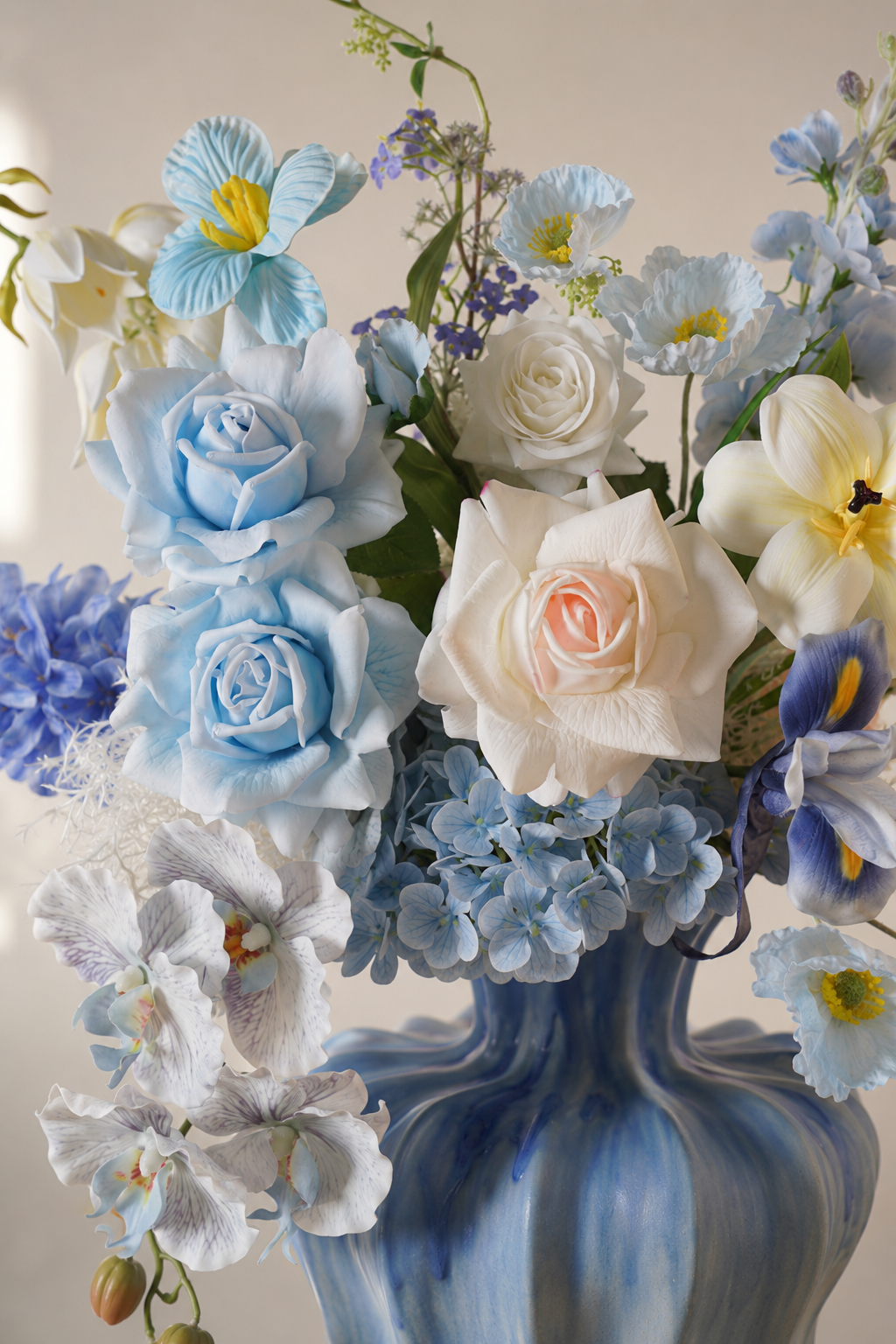 Blue Hydrangea & Rose Faux Floral Arrangement in Sculptural Blue Ceramic Vase