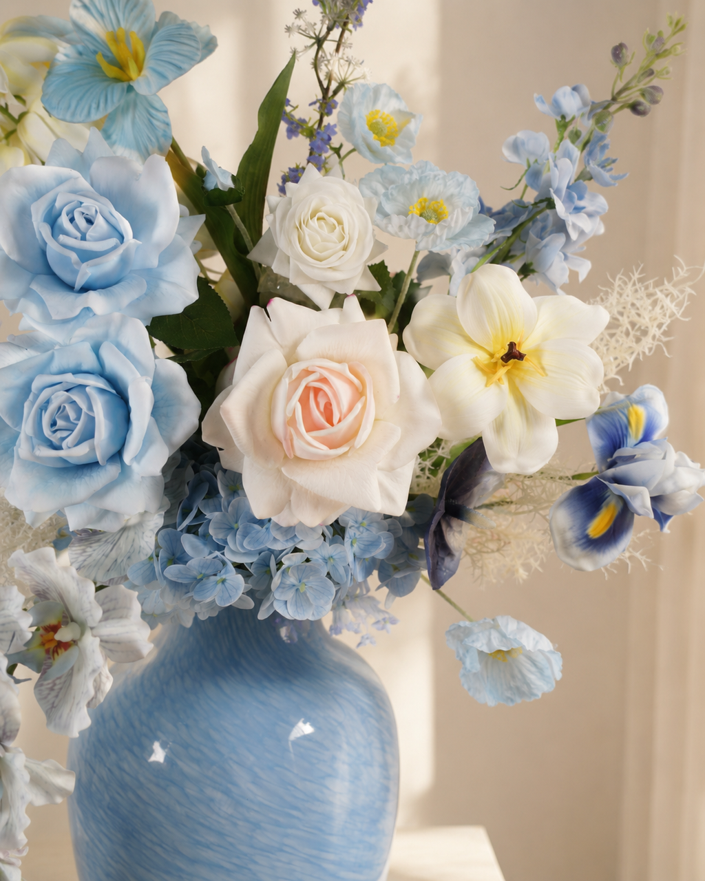 Blue & White Faux Floral Arrangement in Blue Ceramic Vase
